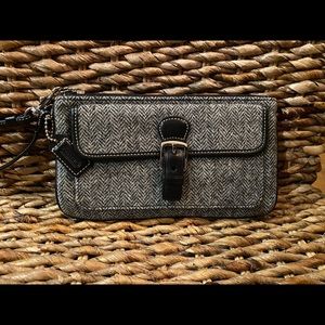 Black & grey herringbone patterned Coach wristlet